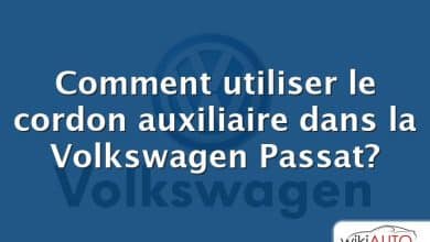 Comment utiliser le cordon auxiliaire dans la Volkswagen Passat?